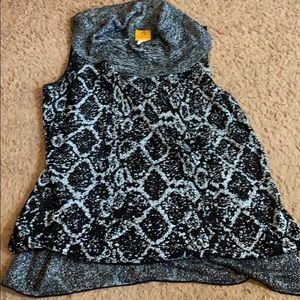 Women’s cowl neck sleeveless sweater.